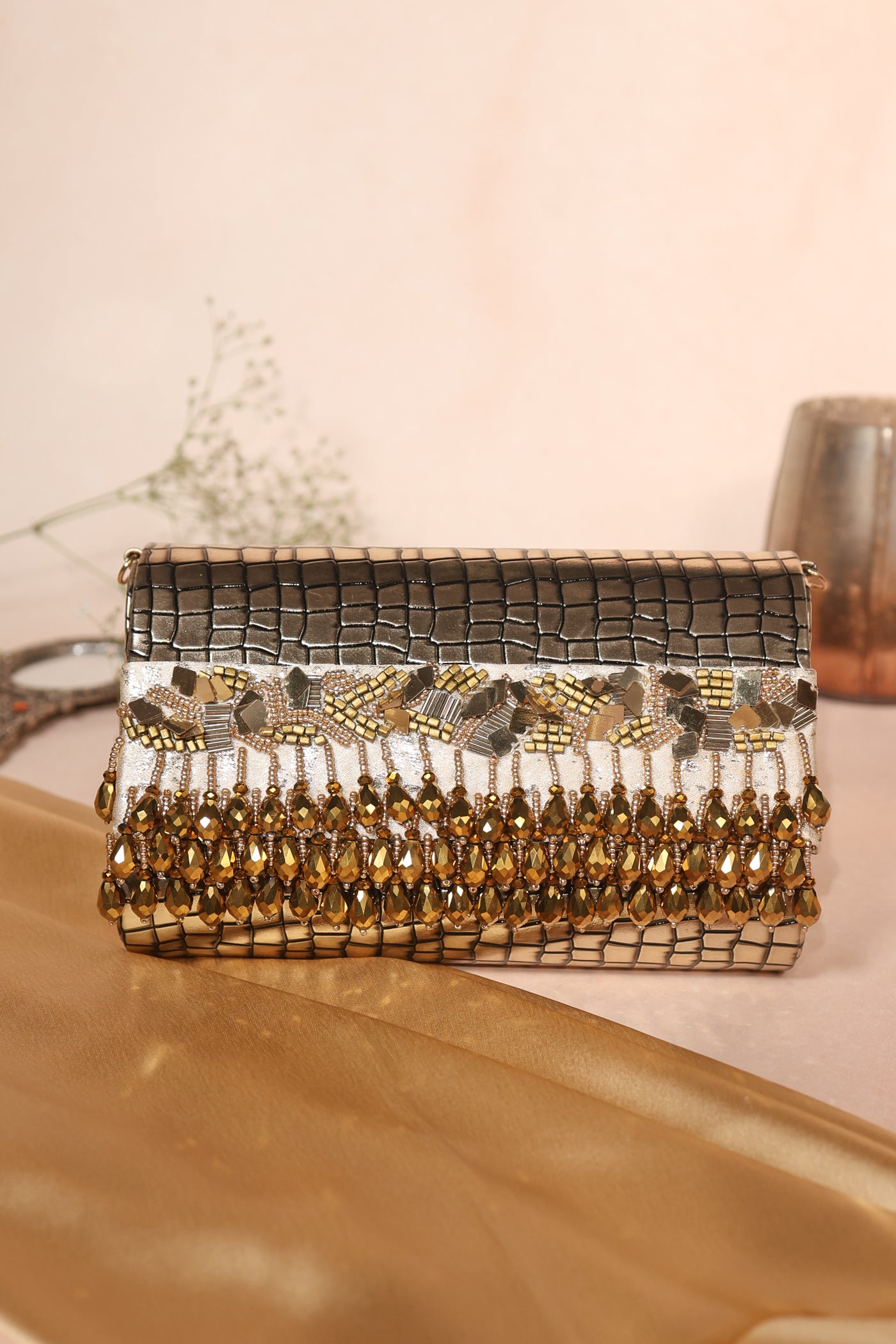 Noorie Gold Handheld Clutch